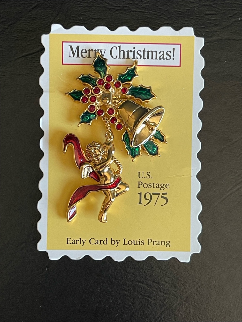 Avon 1975 Smithsonian Institution Christmas bell angle brooch